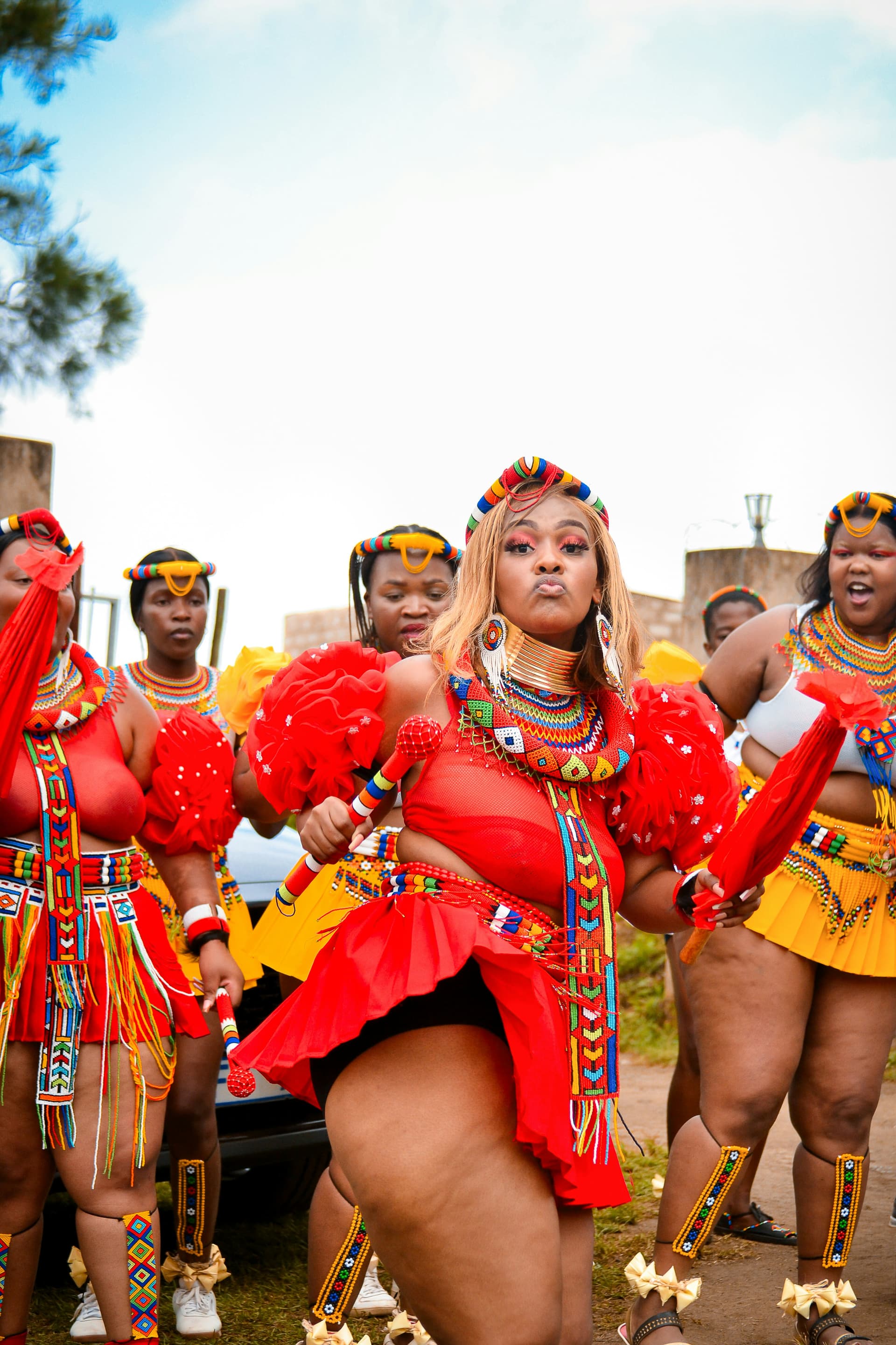 Guests in traditional African attire at a celebration